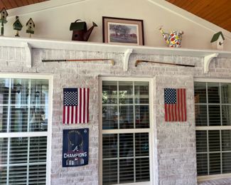 various wall art, American flags, birdhouse decor,