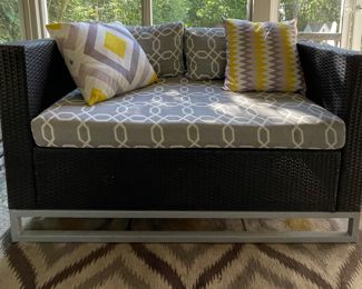 Woven All-Weather Rattan Love Seat. Measures 53" W x 31" D.