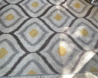 Indoor / Outdoor Graphic Area Rug. Measures 9' 9" x 7' 8".