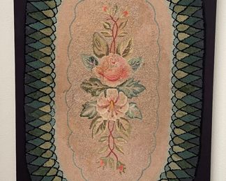 Framed Antique Hooked Rug. Measures 30.5" W x 48" H.