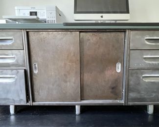 Mid-Century Metal Sliding 2-Door Credenza with 6 Drawers. Measures 70" W x 20" D x 29" H. Photo 4 of 6.