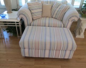 A PAIR OF THESE COMFY CHAIRS WITH OTTOMANS