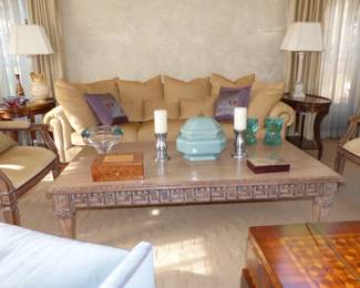 Neutral fabric sofa, coffee table, pairs of chairs, side tables