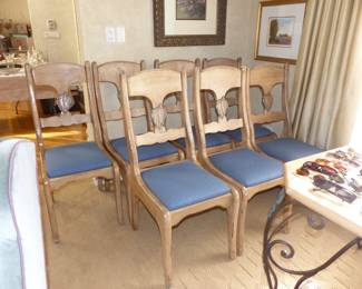 Light wood dining table with iron legs and 7 chairs