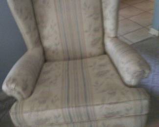 Wing back chair which matches sofa.