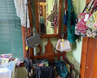 Vintage tree stand, a few purses, including Vera Bradley, Coach, Dooney, and Bourke.