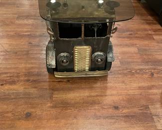 Truck sculpture glass top table