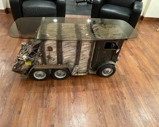 Truck sculpture glass top table