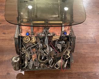 Truck sculpture glass top table