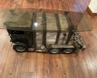 Truck sculpture glass top table