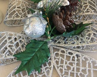 Metal bows embellished