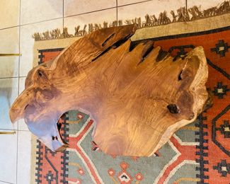 $110 	
Tree stump coffee table 41""Lx2'Tx16""H"	