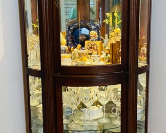 $300 	
corner cabinet glass front bombe 3'Wx56Tx22""D"	