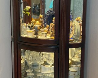 $300 	
corner cabinet glass front bombe 3'Wx56Tx22""D"	