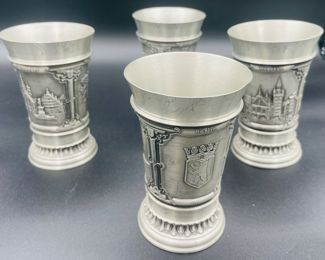 $50 	
Pewter set of 4 beakers 	