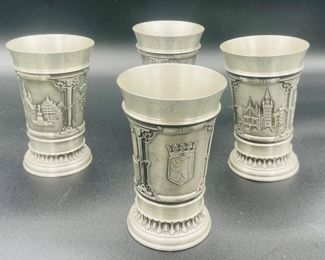 $50 	
Pewter set of 4 beakers 	