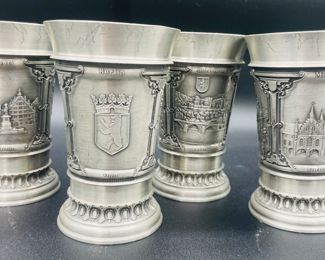 $50 	
Pewter set of 4 beakers 	