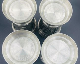 $50 	
Pewter set of 4 beakers 	