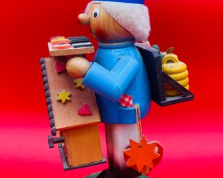 $60 	
Music box Stein 91/2"" Gingerbread baker 