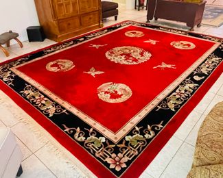 $950 	
Red & black Chinese rug 14'9""x9'1"very good condition	