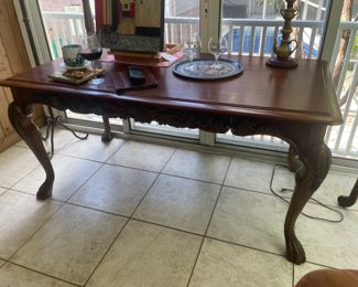 $350 	
Desk with claw feet single drawer 63Wx33Dx30H