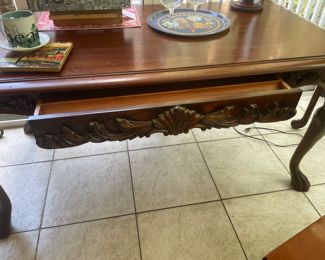 $350 	
Desk with claw feet single drawer 63Wx33Dx30H	