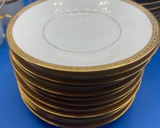 $100 	
Limoges gold banded dessert set 	