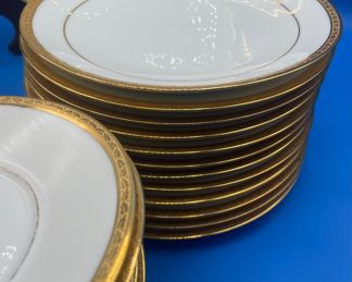 $100 	
Limoges gold banded dessert set 	