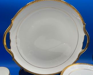 $100 	
Limoges gold banded dessert set 	