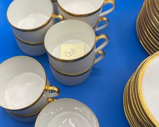 $100 	
Limoges gold banded dessert set 	