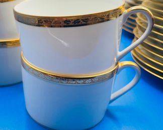 $100 	
Limoges gold banded dessert set 	