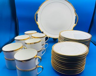 $100 	
Limoges gold banded dessert set 	