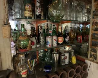 Assorted German beer bottles and cans, liquor bottles 