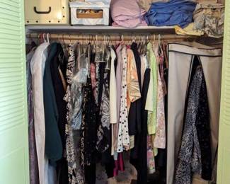 Suitcases and ladies clothing