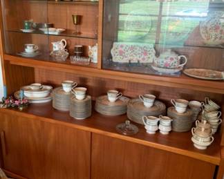 Lighted mid century china cabinet sideboard with sliding glass doors.