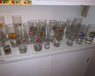 Lots of vintage German beer glasses from many different breweries