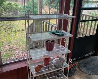 White metal plant or dish display rack