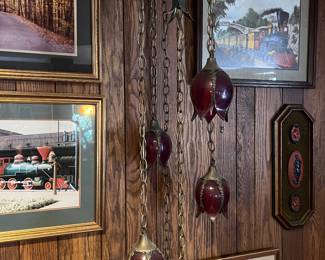Brass chandelier with red glass shades