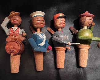 ANRI carved wooden bottle corks