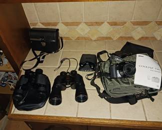 Nikon Coolpix camera, binoculars two pairs