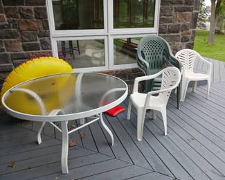 Patio table with plastic chairs