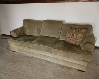 Olive green three person sofa