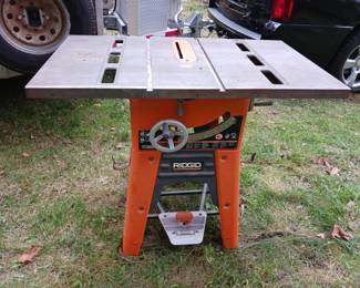 Full size rigid table saw with blades fence and other parts