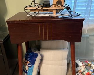 	#34	Mid century sewing machine cabinet with Kenmore sewing machine 24x17x30.5	 $40.00 				