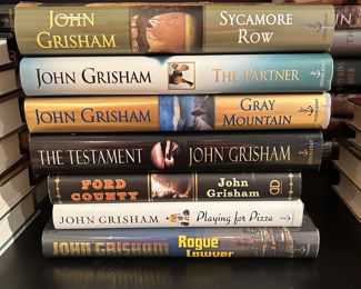 	#91	set #5  7 John Grisham  Signed First Edition books	 $150.00 				