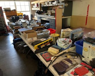 Tons of tools, wrenches, levelers, gloves, car tarps, jig saw, hand saws