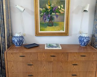 ARTHUR UMANOFF for Cavalier Furniture: 7 Drawer Low boy oak dresser, wall mounted mod lamps, (The Floral Painting has been returned to the family and is no longer available.)