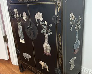 Vintage oriental Chinoiserie Cabinet with  black lacquer w applied stone.
