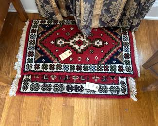 2 small fringed rugs $25. each