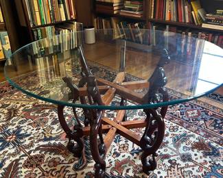 Folding Chinese Rosewood Table with 3' round glass top, adjustable folding base measures 22"  Rug is SOLD